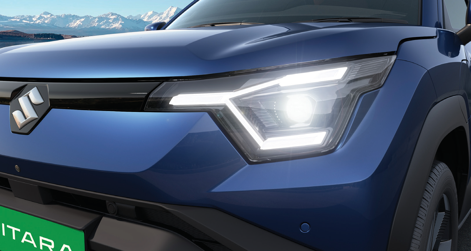 Maruti Suzuki e Vitara — LED headlamps with a three-point LED signature and a connected light bar running across the nose.