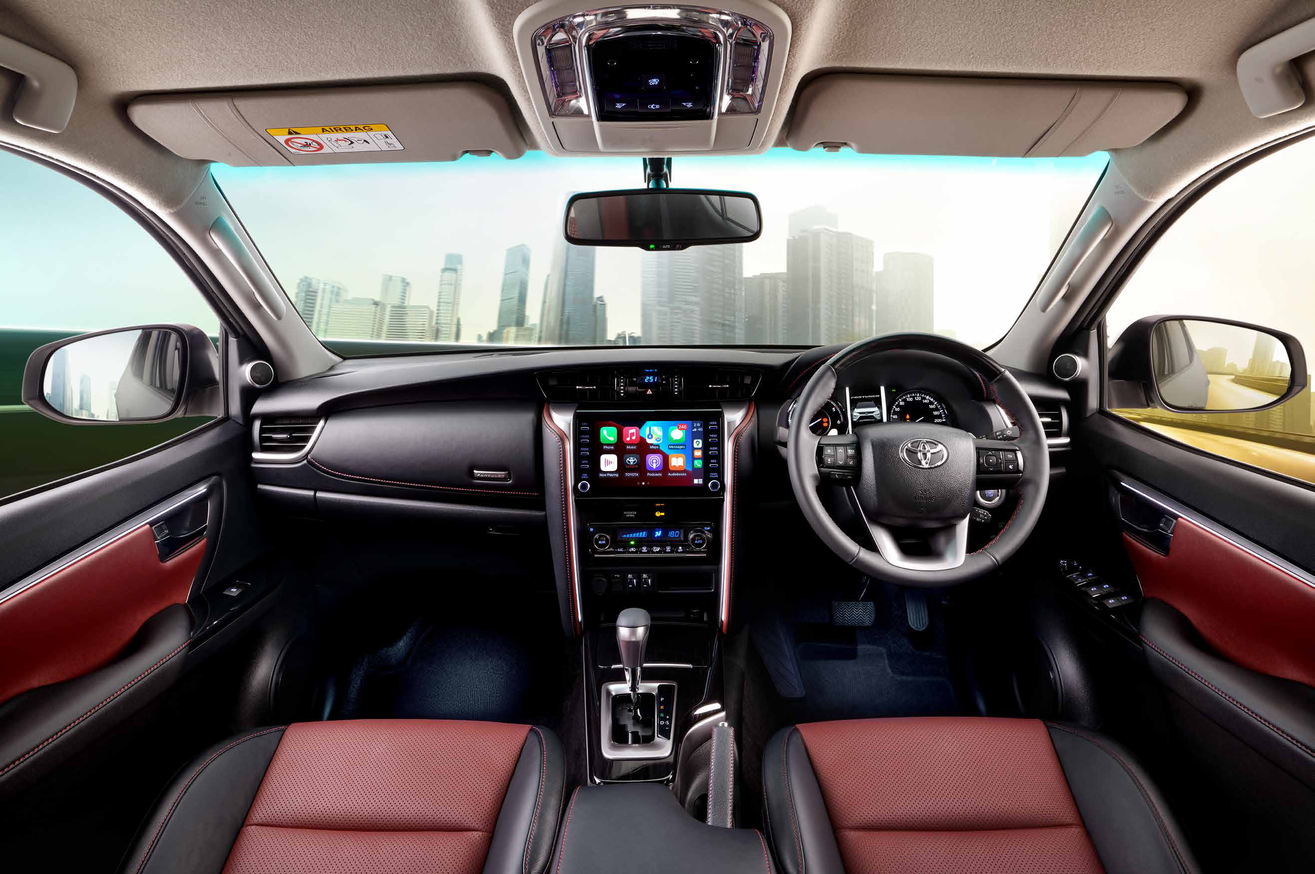 Toyota Fortuner Legender — Driver-focused dual-tone red and black cabin