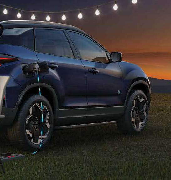 Tata Harrier EV — Vehicle-to-Load (V2L) technology powers appliances from the charging port, turning the SUV into a mobile power hub