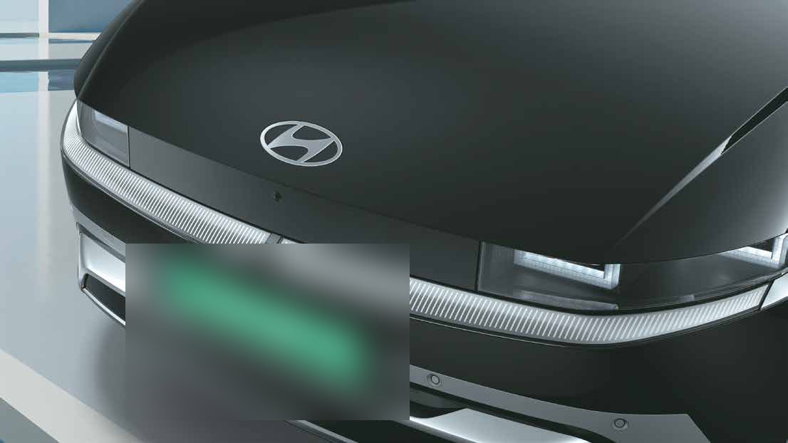 Hyundai Ioniq 5 — Clamshell hood spans the full car width with front LED accent lighting