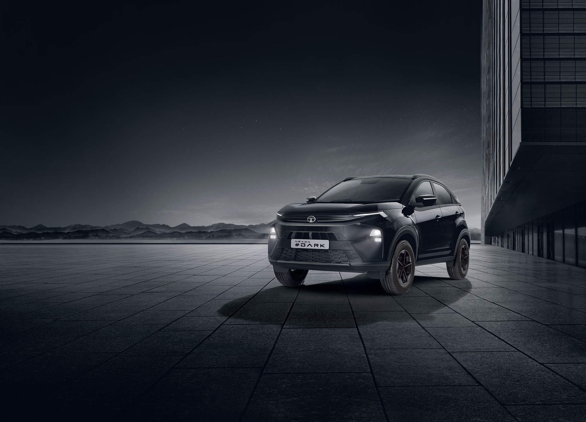 Tata Nexon — Nexon #DARK edition - all-black exterior with blacked-out grille and alloy wheels