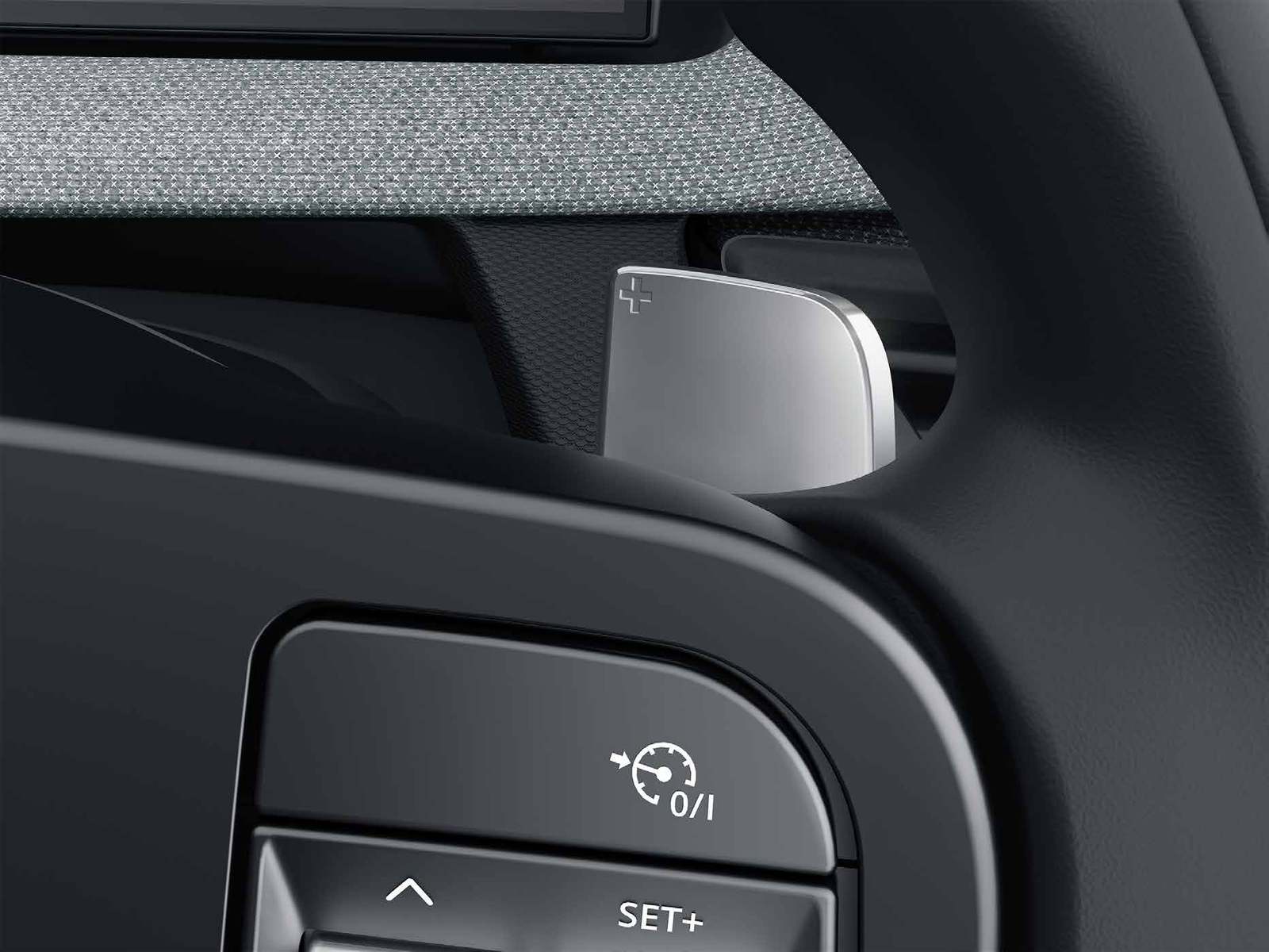 Tata Tiago — Paddle shifters on the AMT give manual gear control from the SportLuxe wheel, with cruise control buttons alongside