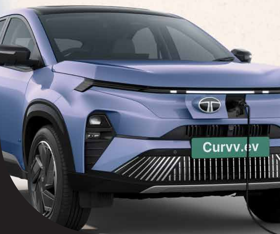 Tata Curvv EV — 15A portable charger plugs into the electric front charging lid - charge from any 15A socket