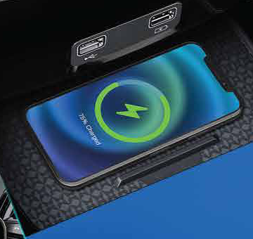 Mahindra XUV400 — Wireless smartphone charging pad with USB ports on the centre console