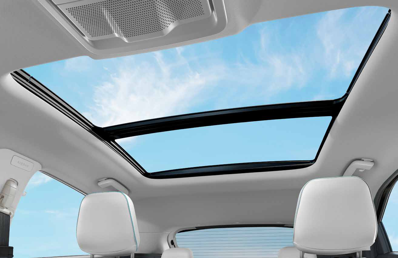 Tata Nexon EV — Voice-assisted panoramic sunroof spanning both seat rows