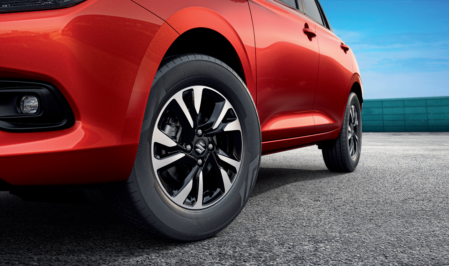 Maruti Suzuki Swift — Precision-cut dual-tone machined alloy wheels