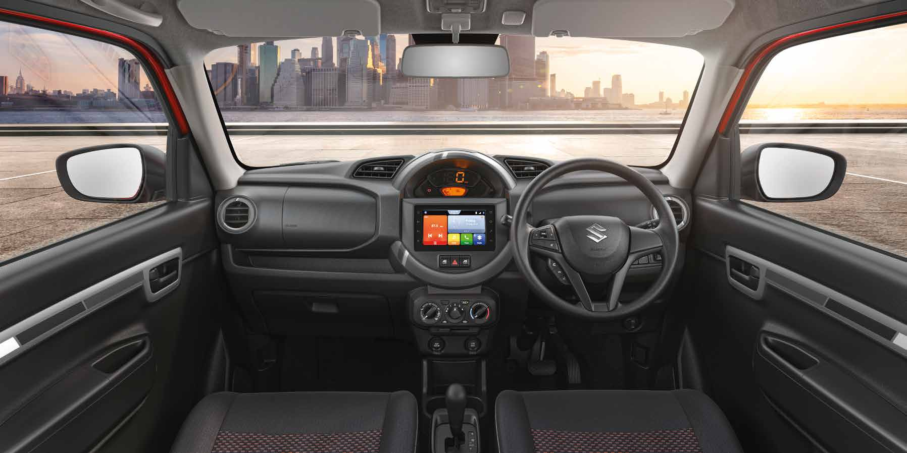 Maruti Suzuki S-Presso — Dual-tone dashboard with commanding high-view seating and body-coloured cabin accents.