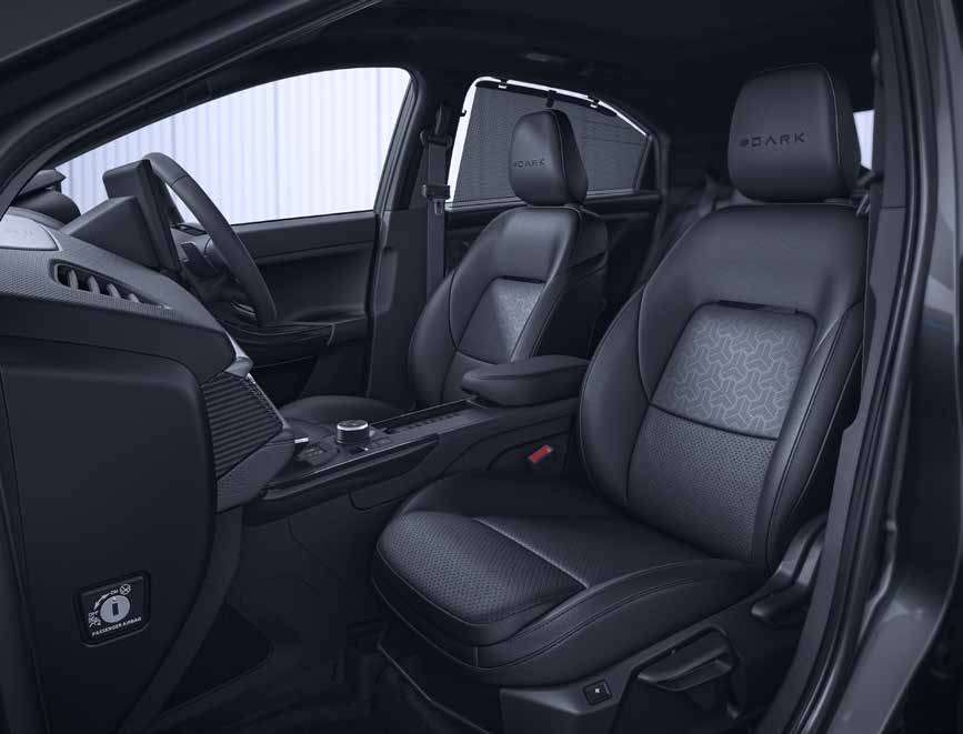 Tata Curvv — Leatherette seats with #DARK insignia and geometric-pattern inserts, exclusive to the #DARK edition.
