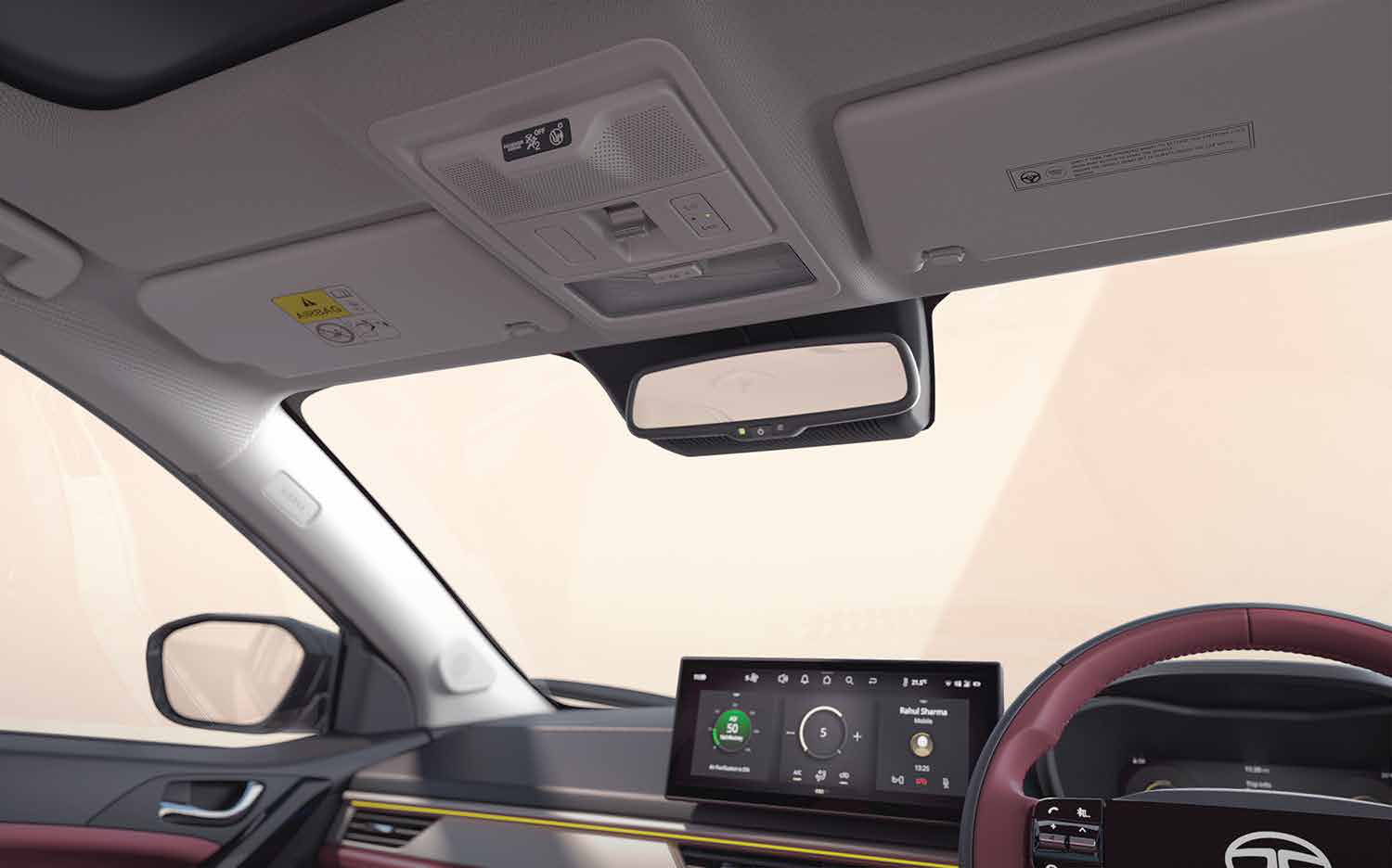 Tata Curvv — Electrochromatic IRVM with auto dimming cuts glare from trailing headlights for clear rearward vision.