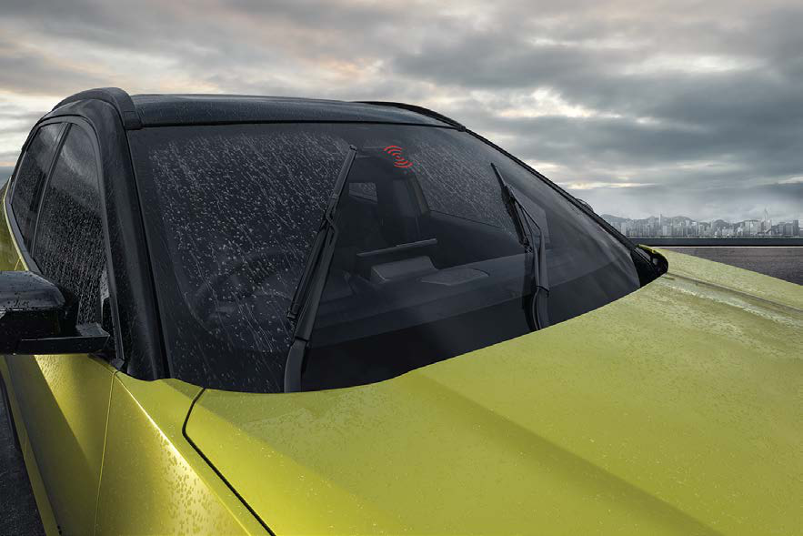 Tata Harrier — Auto headlamps and rain-sensing wipers with mist spray