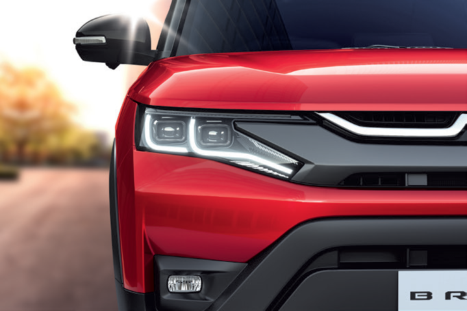 Maruti Suzuki Brezza (2022-2025) — Dual LED projector headlamps with LED daytime running lamps.