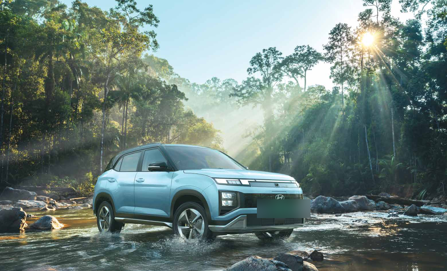 Hyundai Creta Electric — Bold SUV stance with pixelated graphic grille and LED headlamps