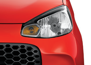 Maruti Suzuki Alto K10 — Halogen headlamp cluster with integrated turn-indicator