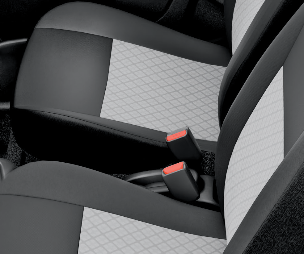 Maruti Suzuki Alto K10 — Front seats with dual-tone fabric upholstery and seatbelt buckles