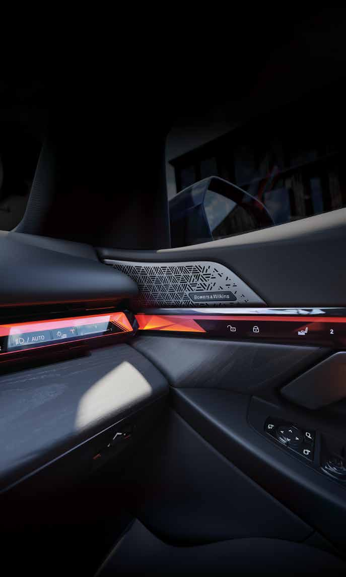 BMW 5 Series  — BMW Interaction Bar with adaptive ambient lighting and a Bowers & Wilkins speaker grille