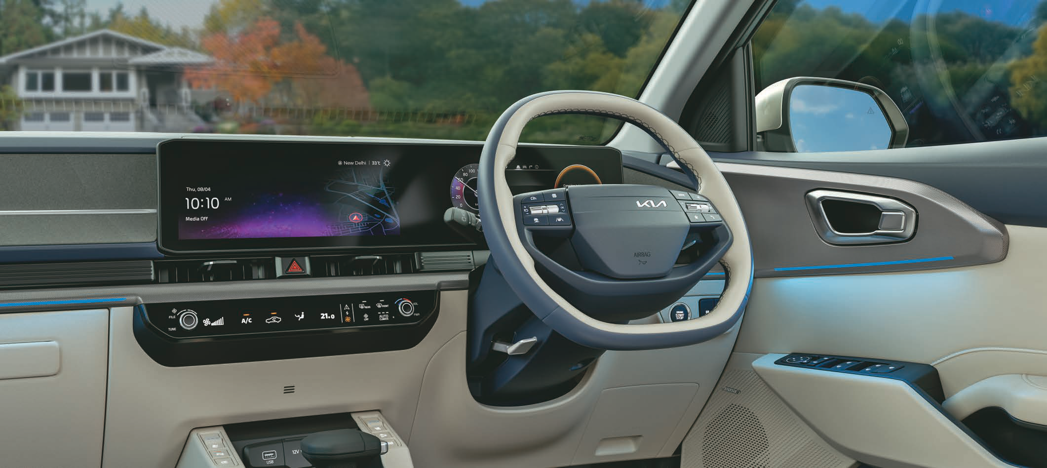Kia Carens Clavis — Driver-focused cabin with the dual panoramic display and D-cut steering wheel