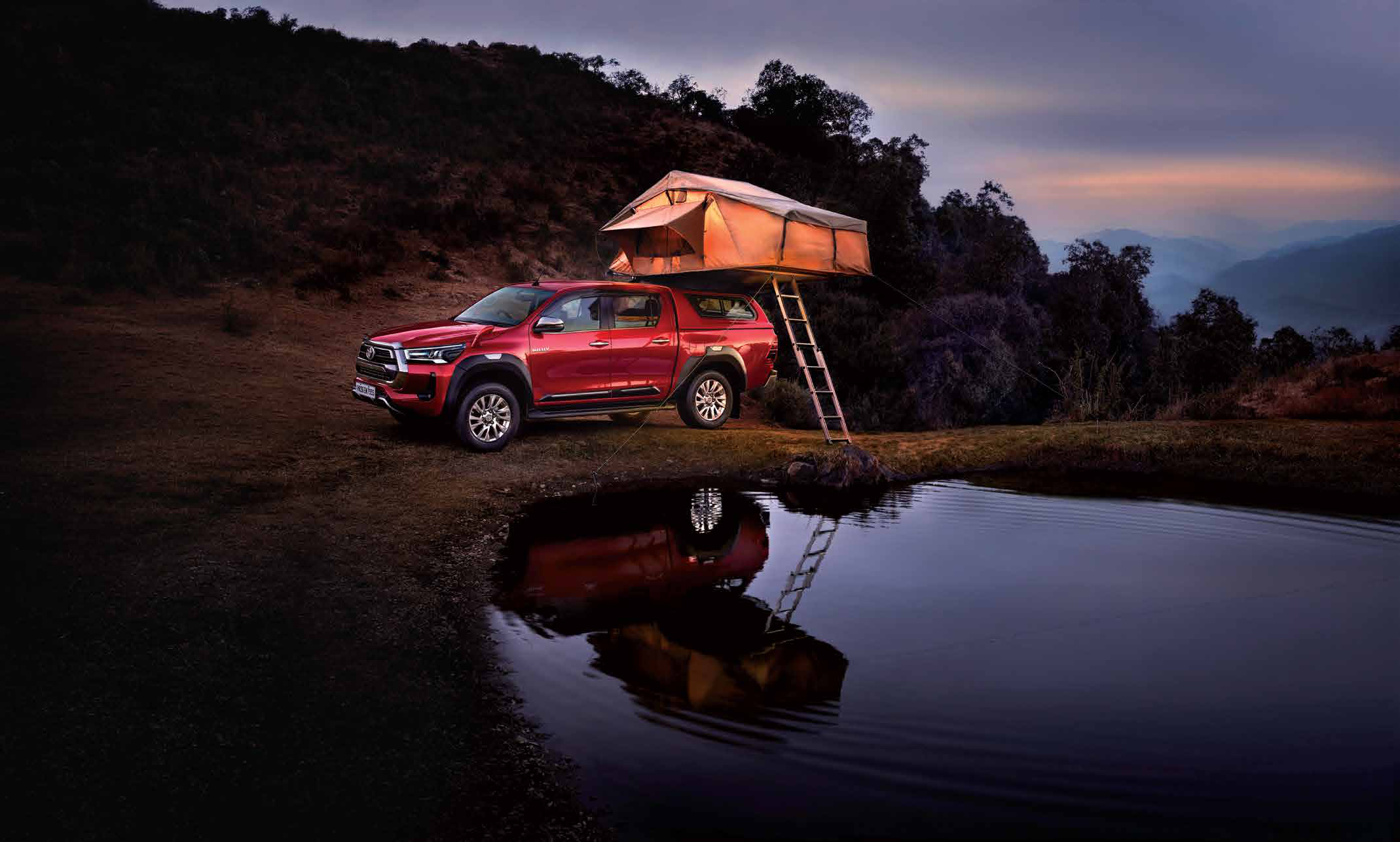 Toyota Hilux (2022-2025) — Load bed sealed by a moulded hard deck cover over the pickup tub.