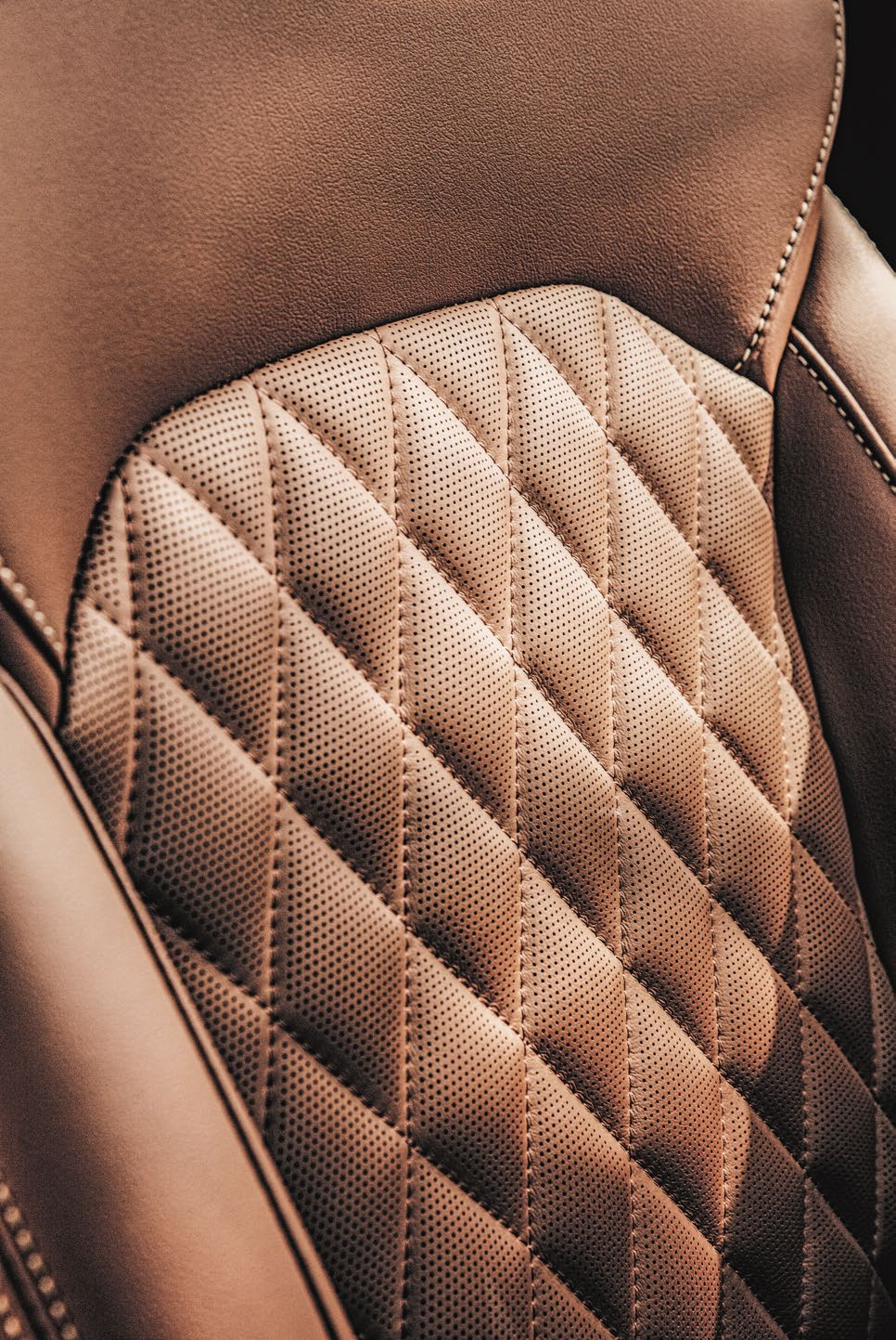 MG Gloster — Diamond-quilted perforated-leather upholstery