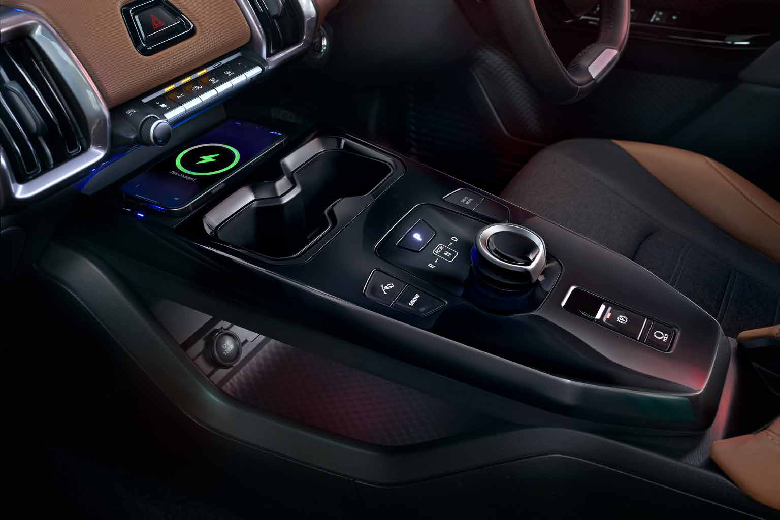 Toyota Urban Cruiser Ebella — Wireless smartphone charger on the floating centre console