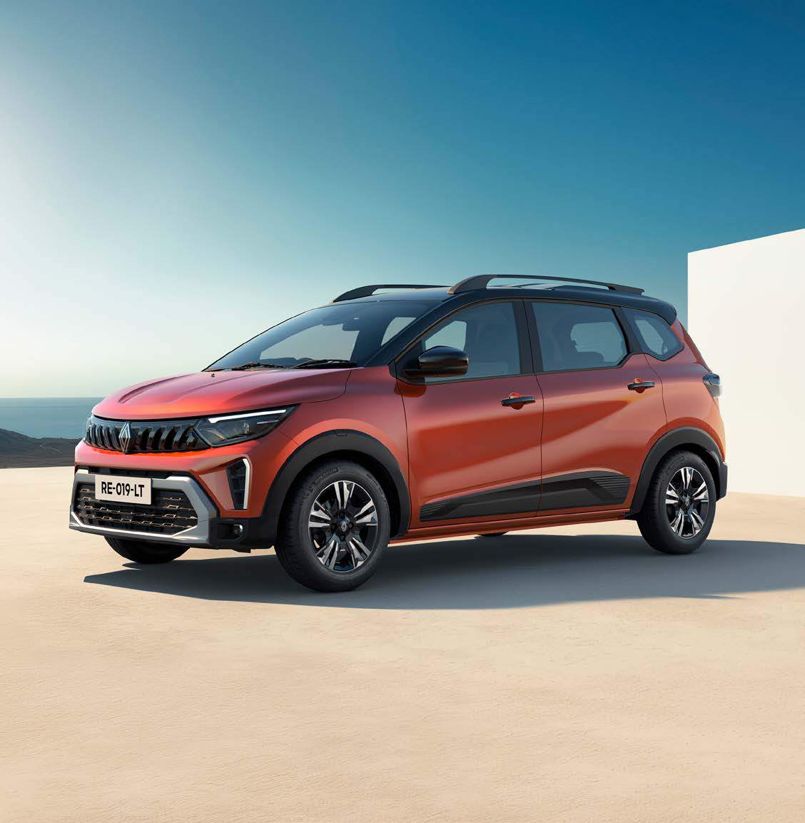 Renault Triber — Front three-quarter stance with dual-tone black roof and blacked-out pillars
