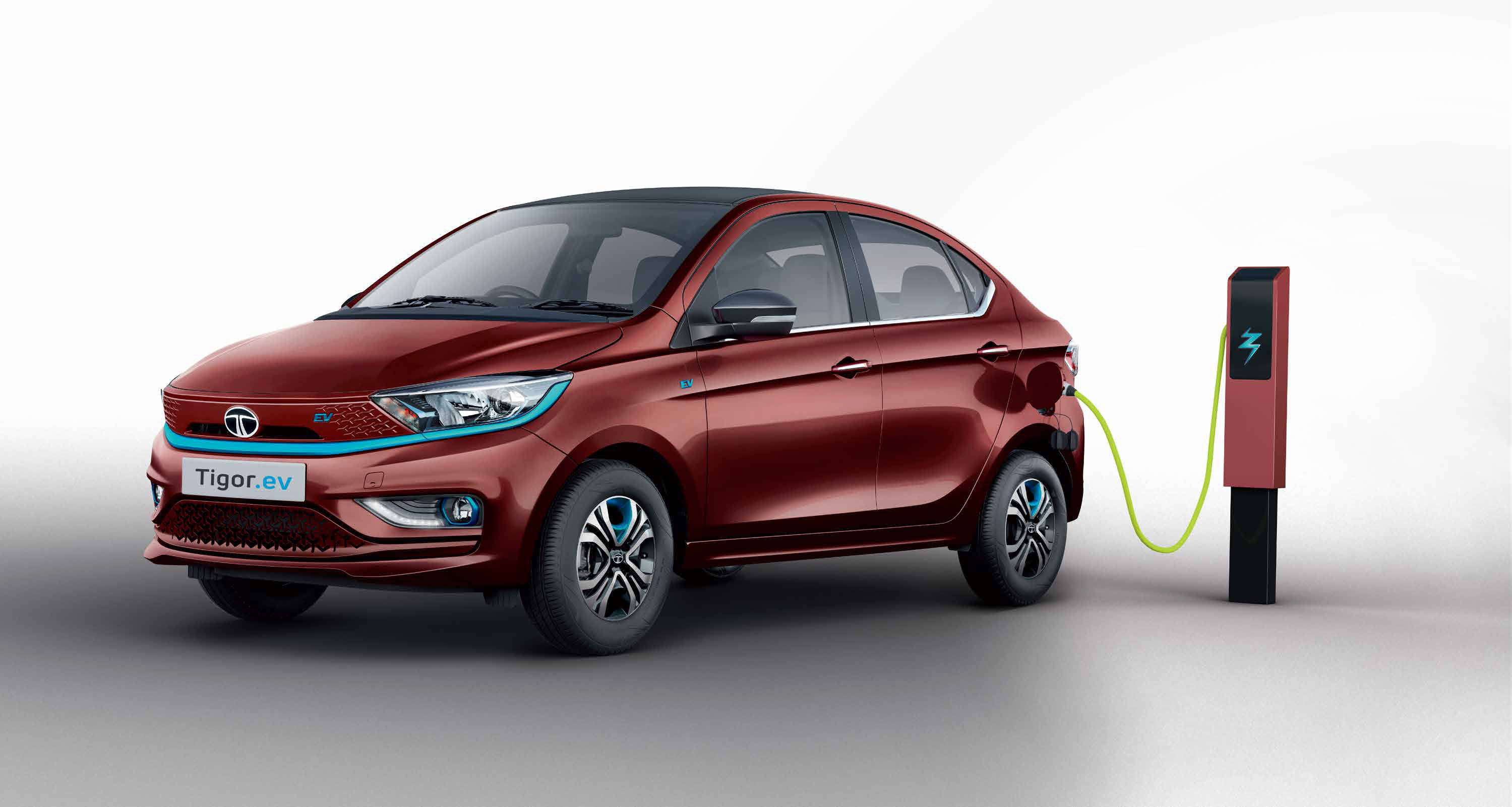 Tata Tigor EV — Home and on-road charging options: DC fast charging takes the battery from 10% to 80% in 59 min, while a 15A socket or AC home wallbox charges 10% to 100% in 9.4 hours