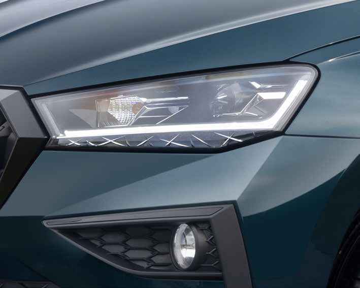 Skoda Slavia — Crystalline LED headlamp with L-shaped LED daytime running lamp and integrated fog lamp.