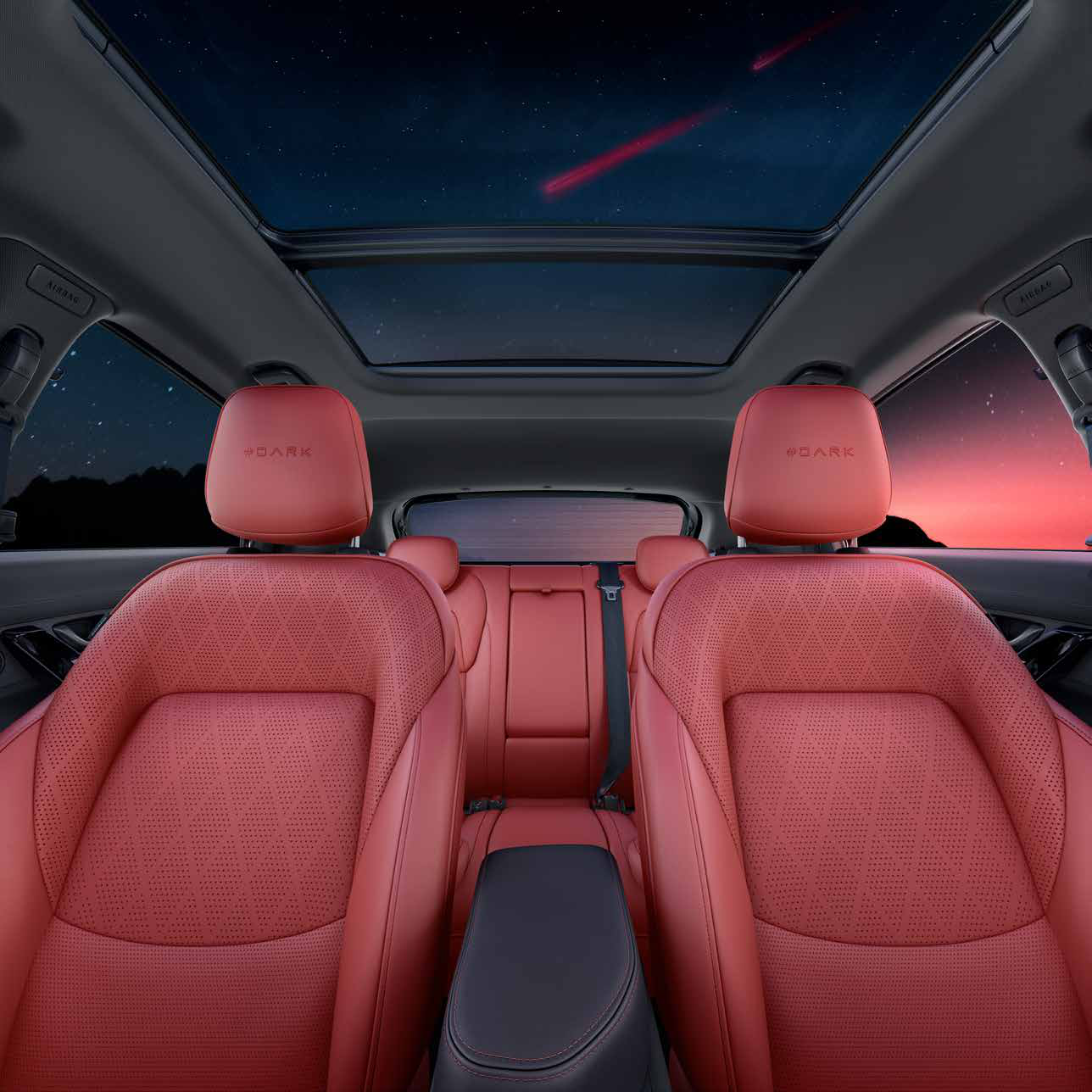 Tata Nexon EV — Nexon.ev Red #DARK cabin - red perforated leatherette seats with #DARK headrests under the panoramic sunroof