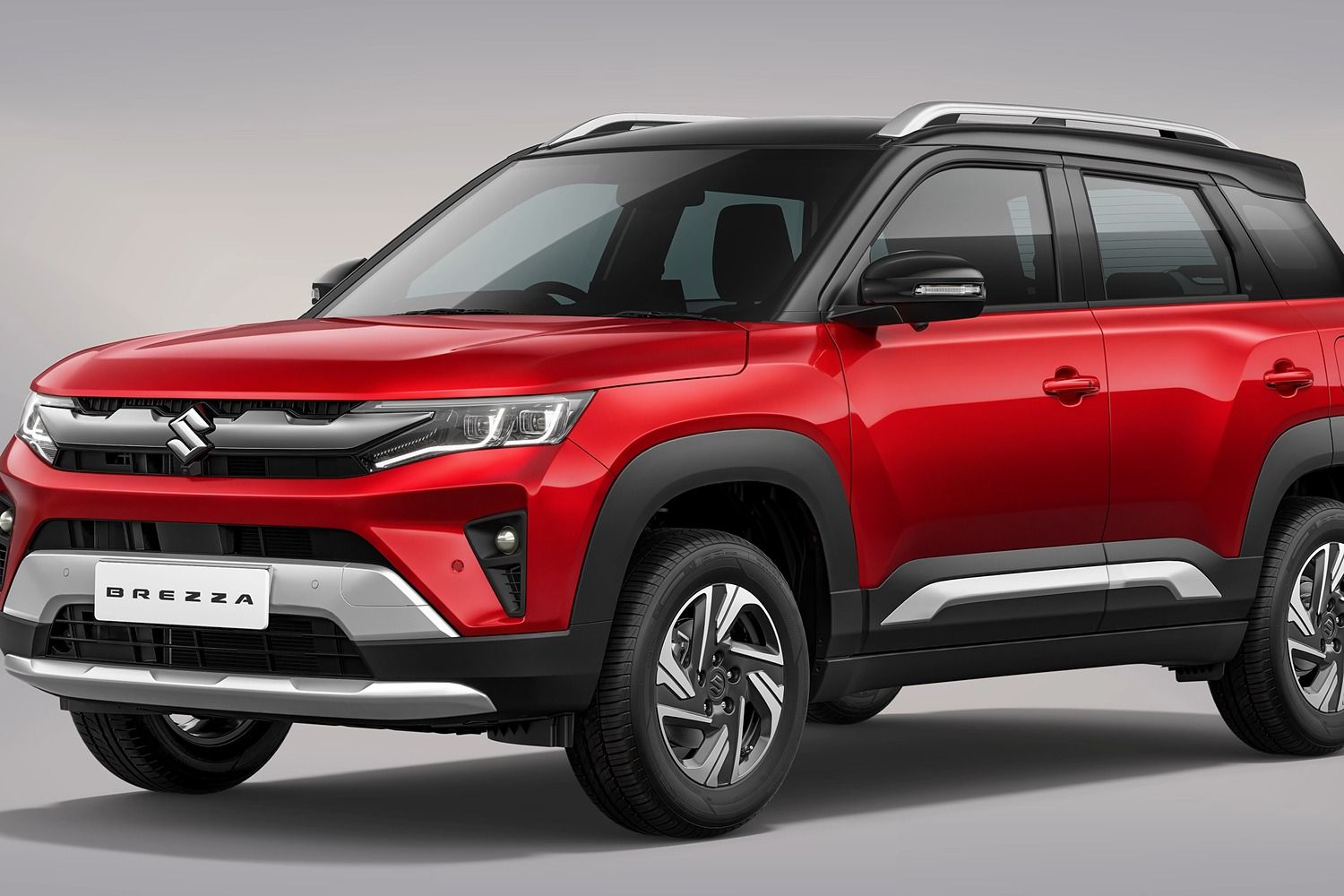 Maruti Suzuki Brezza — Redesigned grille with a slim red accent, floating LED daytime running lamps and LED projector headlamps.