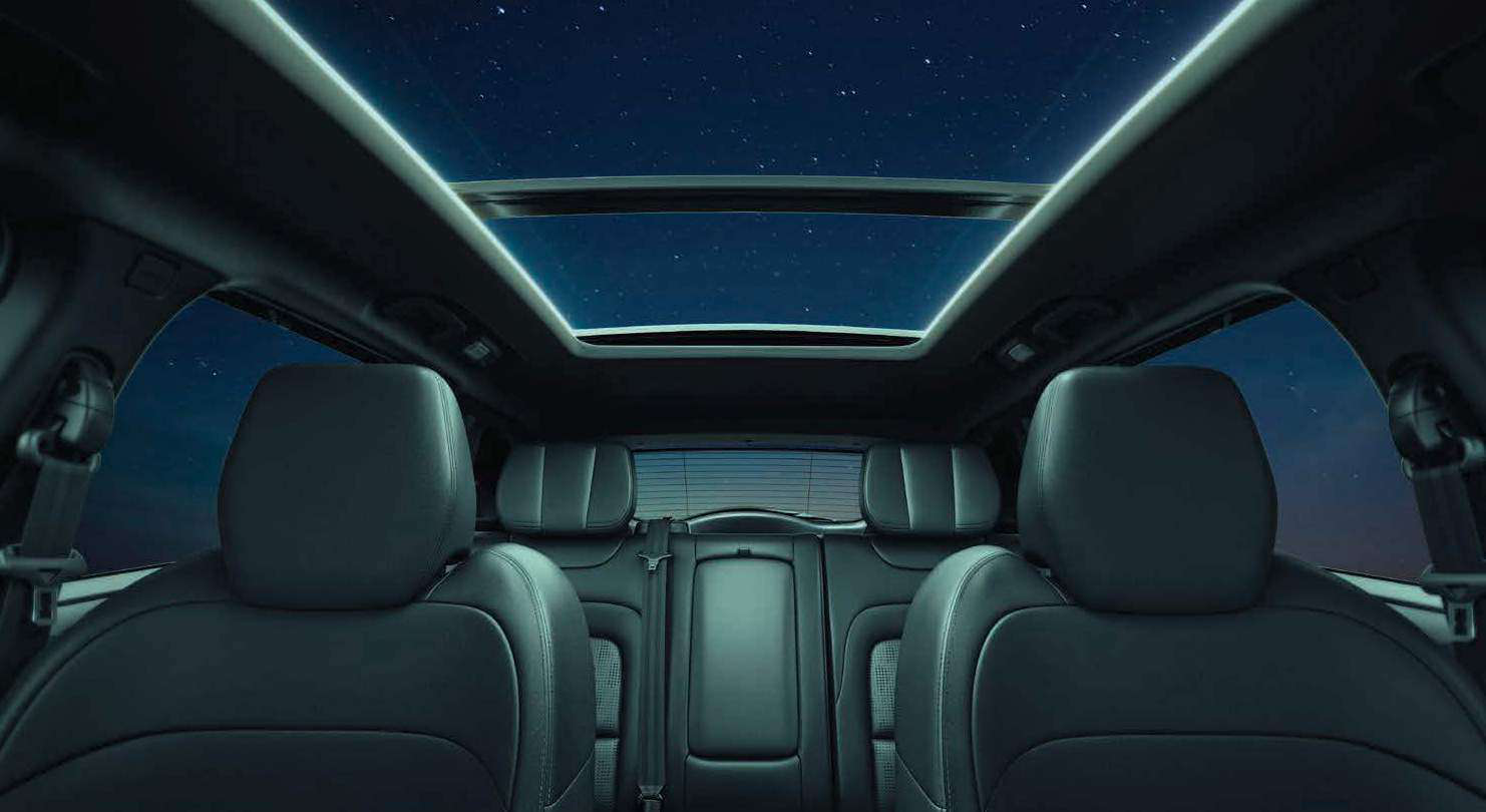 Tata Harrier EV — Stealth Edition's Carbon Noir cabin beneath the panoramic sunroof