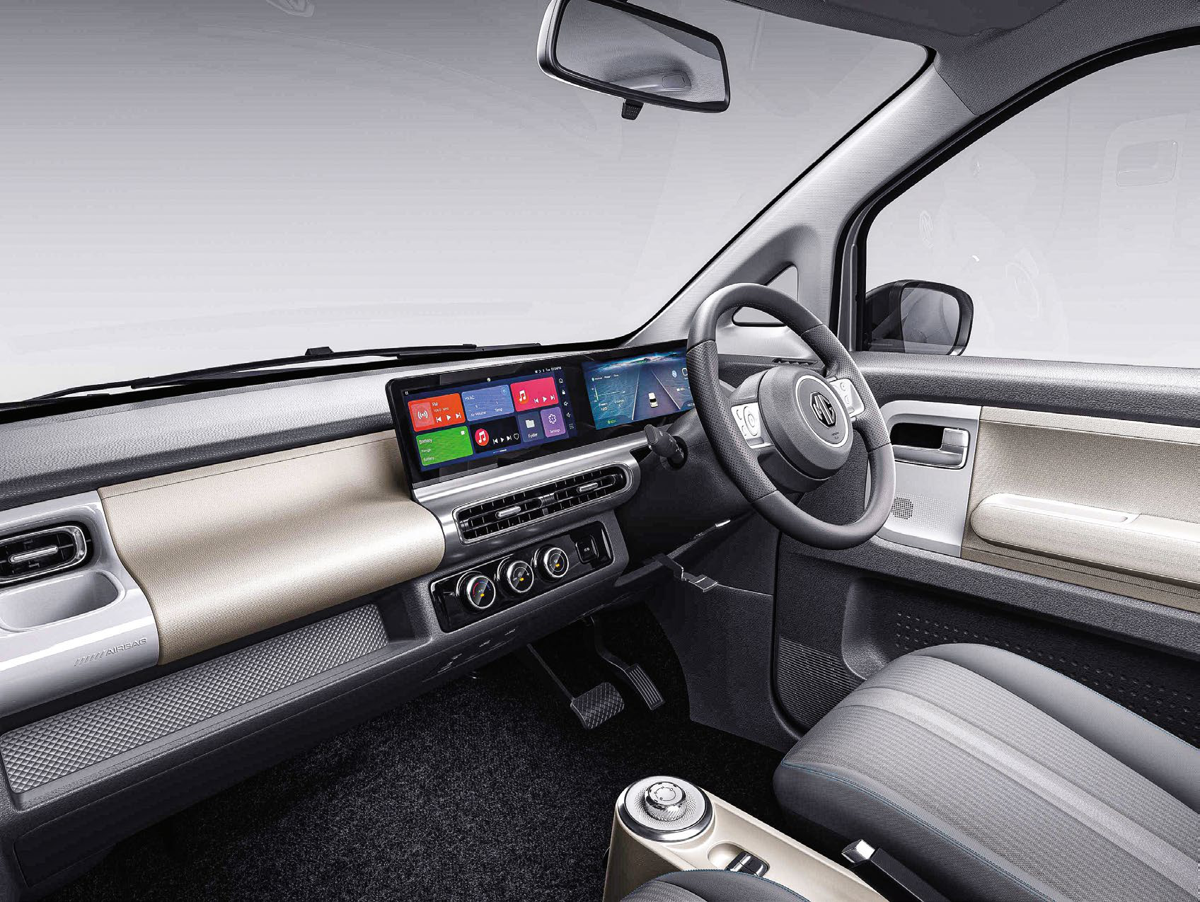 MG Comet EV — Floating twin 26.04 cm (10.25") displays: driver cluster and infotainment