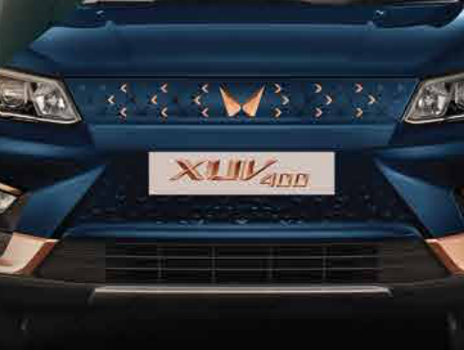 Mahindra XUV400 — Signature front grille with copper twin-peaks logo and X-motif detailing