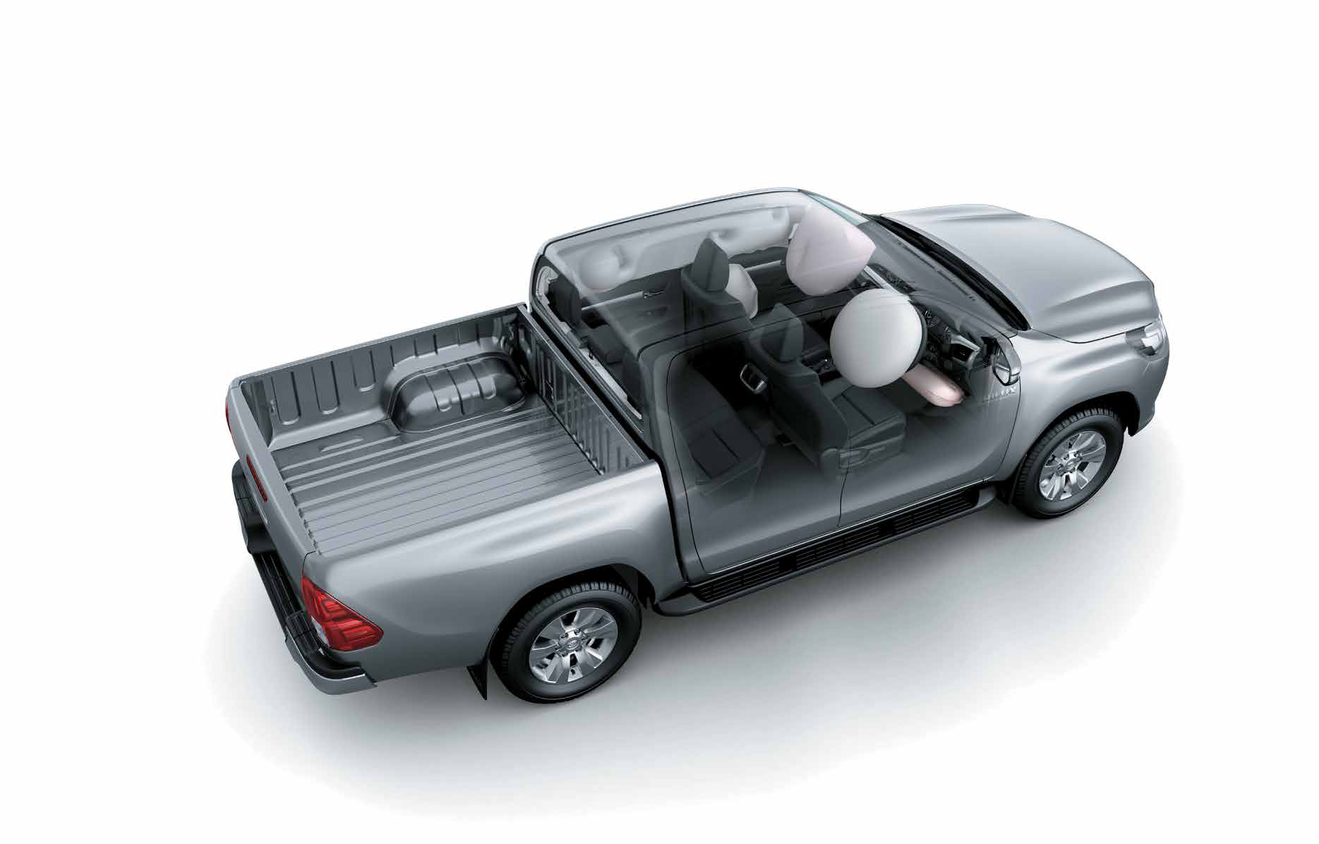 Toyota Hilux (2022-2025) — Cutaway shows airbags deployed to protect front and rear occupants.