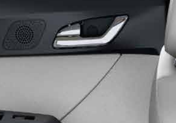 Tata Tigor EV — Chrome inner door handles add a premium touch to the cabin